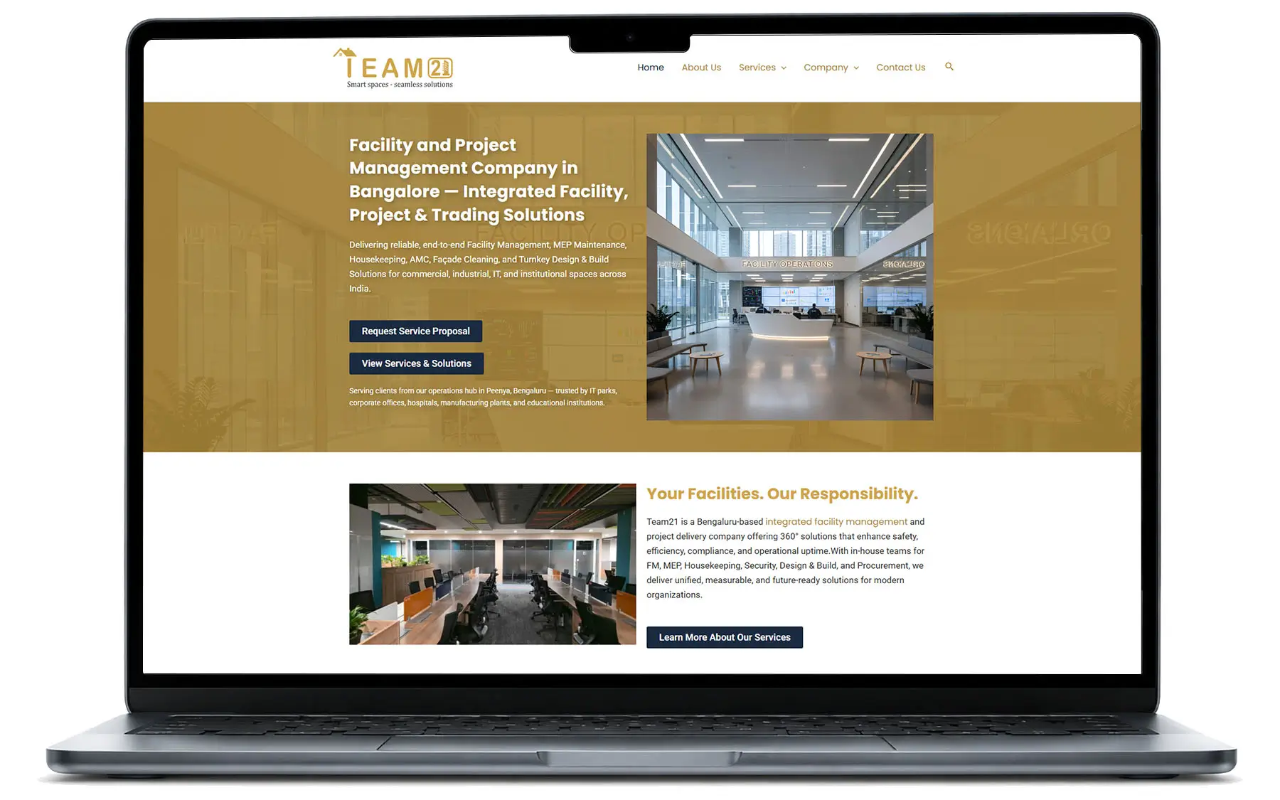 Laptop mockup displaying the Team21 PFM website designed and developed by Axis Media for a facility and project management company in Bengaluru.